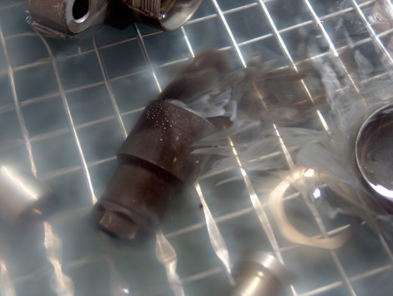 Aqueous parts cleaning of the oily part by Zenith Ultrasonics in Rockaway, NJ